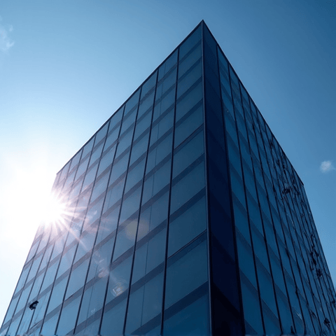 Modern office exterior benefiting from energy-efficient window tinting in Santa Clarita. The advanced film enhances the building